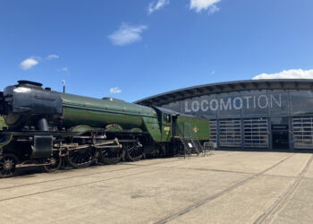 Exterior of Locomotion railway museum in Shildon, complete with a train carriage out front