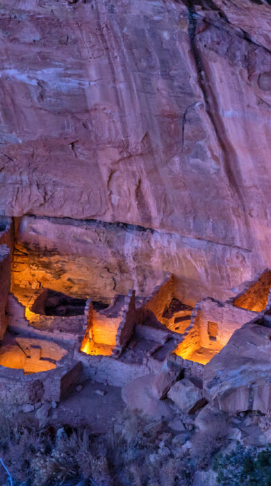 Square Tower House, the tallest cliff dwelling in Mesa Verde, illuminated during the Luminaria Festival in Mesa Verde National Park, Colorado
