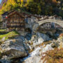 Beautiful bridge in Rassa, Italy, during autumn